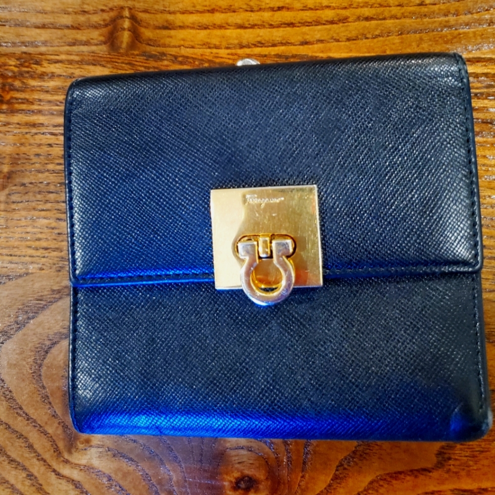 Salvatore Ferragamo Black Leather trifold wallet with coin clasp